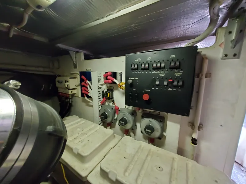 Slide: The Image of Electrical control panel in the engine room of a 2003 Carver 570 Voyager Pilothouse. - 29