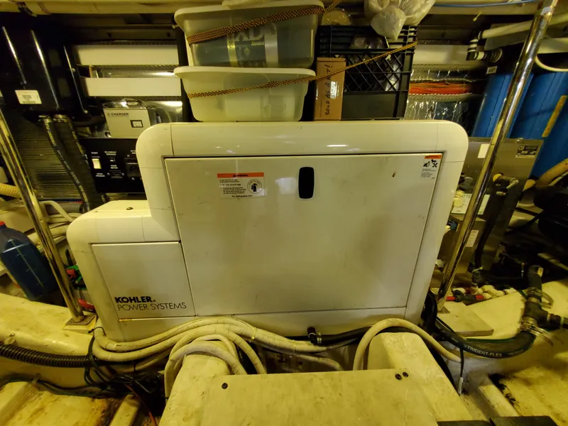 Slide: The Image of Kohler Power Systems generator in 2003 Carver 570 Voyager Pilothouse engine room. - 30