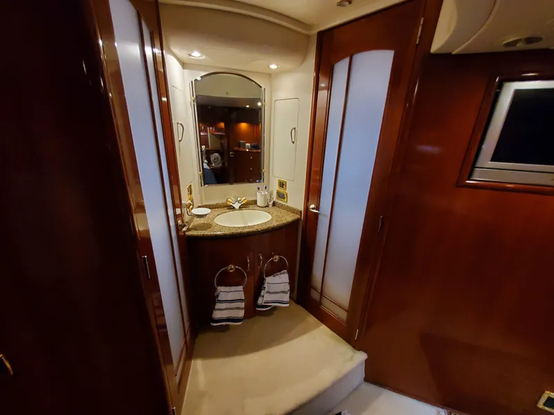 Slide: The Image of Luxurious bathroom in 2003 Carver 570 Voyager Pilothouse yacht with granite countertop. - 47