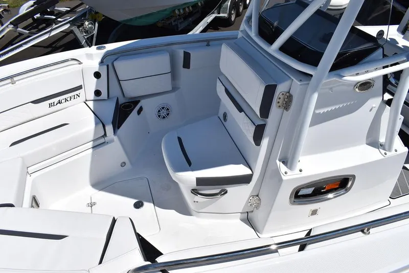 Slide: The Image of 2023 Blackfin 252CC boat interior with seating and storage compartments. - 13