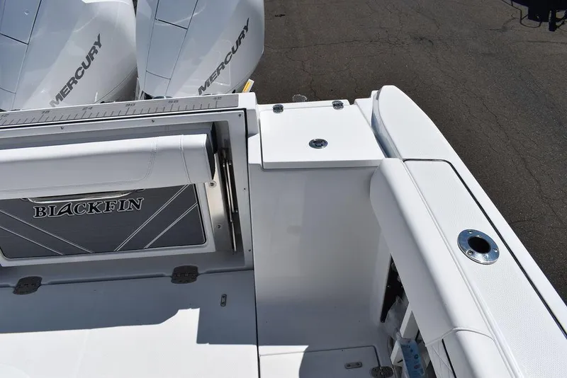 Slide: The Image of 2023 Blackfin 252CC boat deck with Mercury engines. - 14