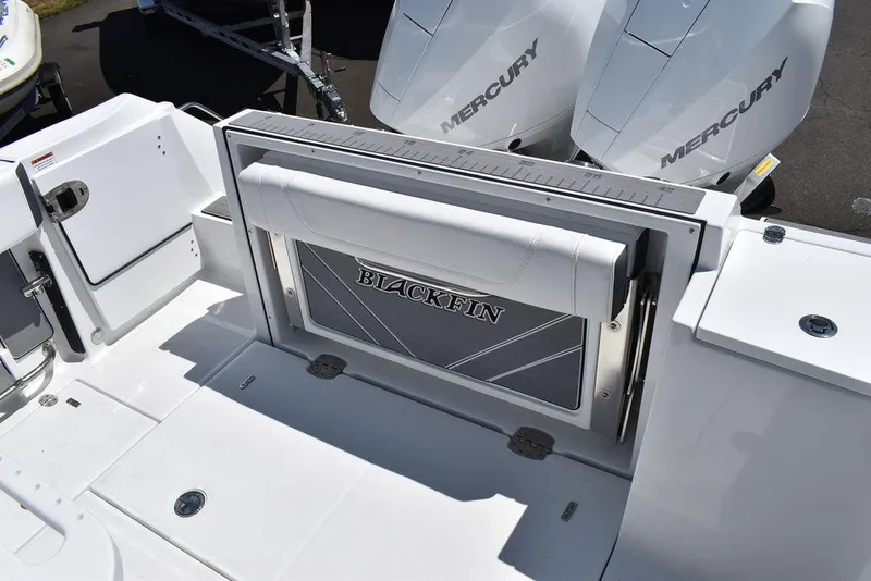 Slide: The Image of 2023 Blackfin 252CC boat with Mercury engines and foldable seating. - 19