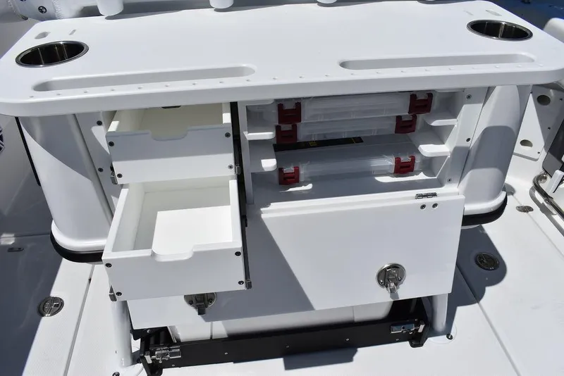 Slide: The Image of 2023 Blackfin 252CC boat storage compartments and drawers. - 22