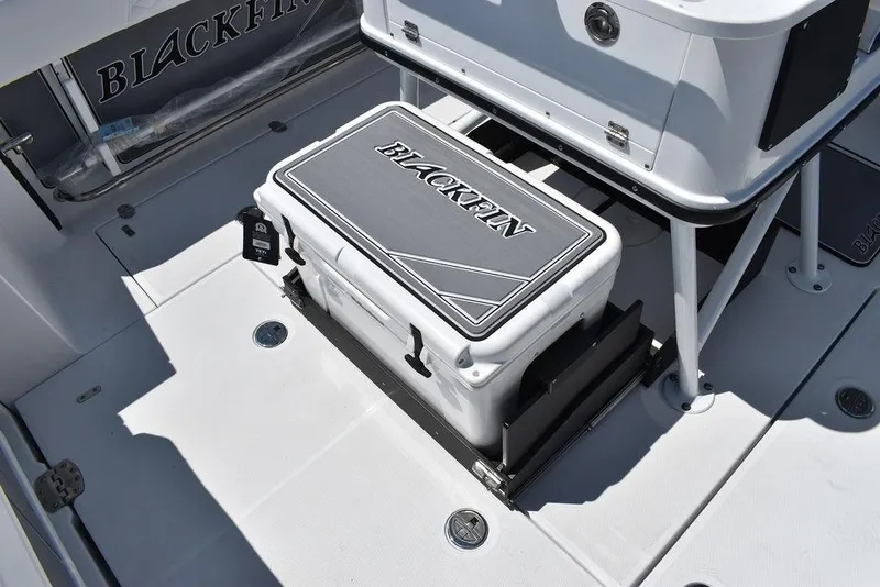 Slide: The Image of 2023 Blackfin 252CC boat deck with cooler storage. - 23