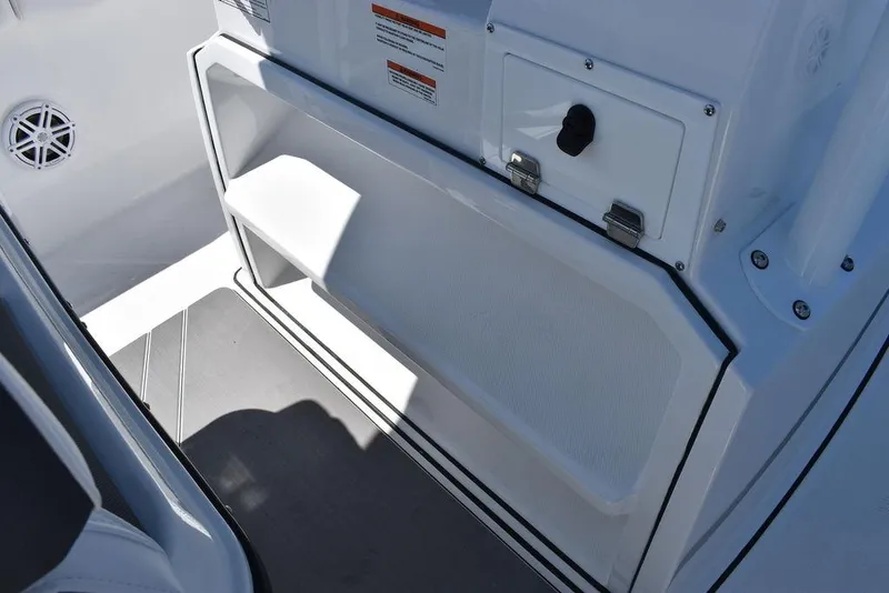 Slide: The Image of 2023 Blackfin 252CC boat interior storage compartment and seating area. - 30