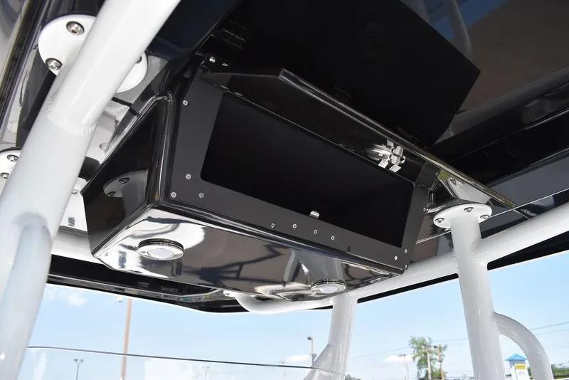 Slide: The Image of 2023 Blackfin 252CC center console storage compartment. - 37