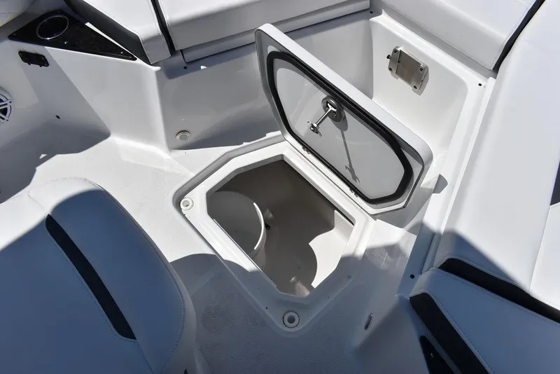 Slide: The Image of 2023 Blackfin 252CC boat storage compartment with open hatch. - 44