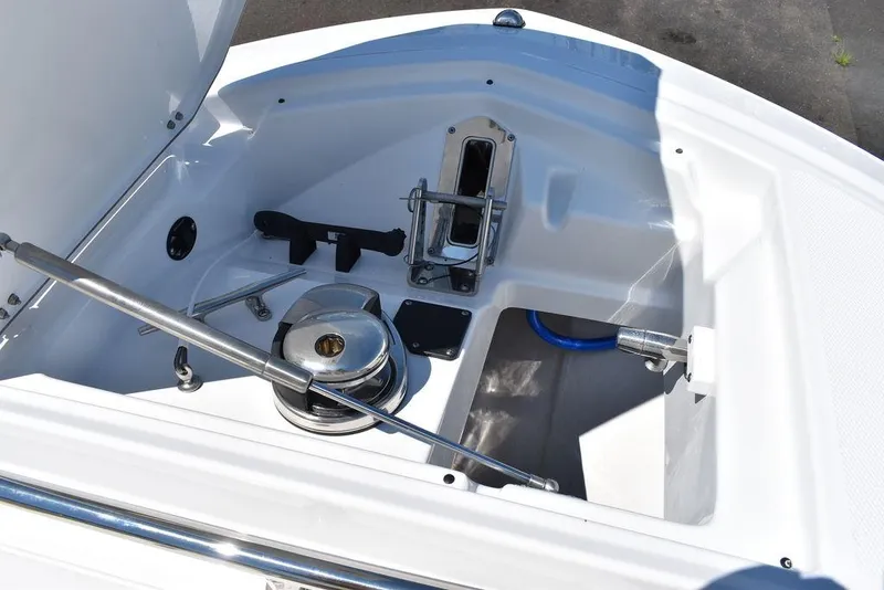 Slide: The Image of 2023 Blackfin 252CC anchor locker with windlass and storage compartments. - 47