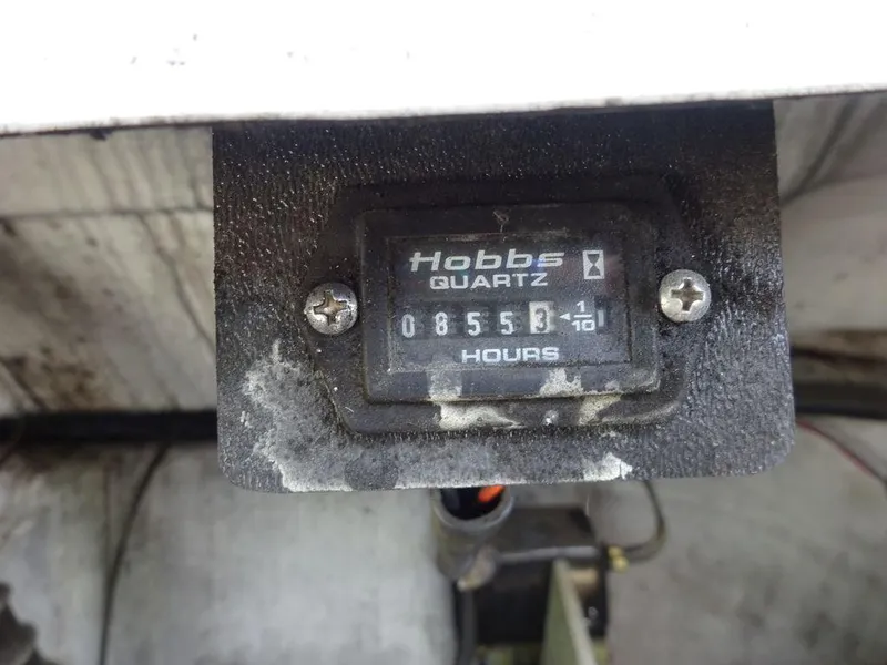 Slide: The Image of 1999 Cobalt 253 Hobbs Quartz hour meter reading 855.3 hours. - 19