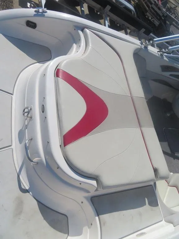 Slide: The Image of 2012 Bryant 246 boat with white and red seating. - 9