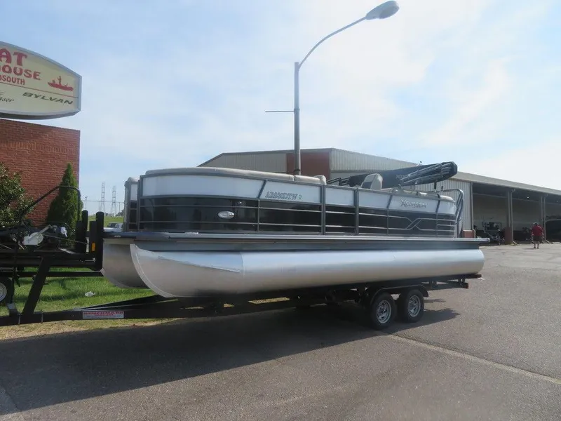 Slide: The Image of 2020 Xcursion 245 Sport Toon pontoon boat on trailer. - 19