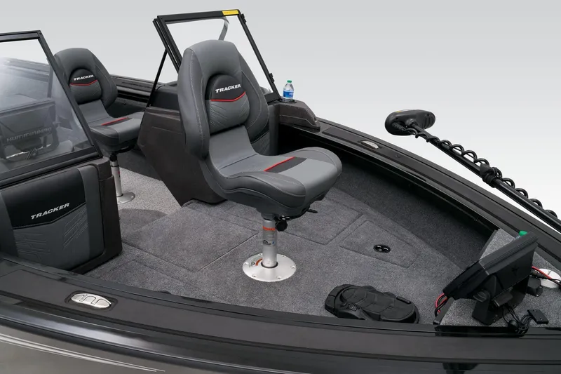 Slide: The Image of 2023 Tracker Targa V-19 WT boat interior with seating and control panel. - 11