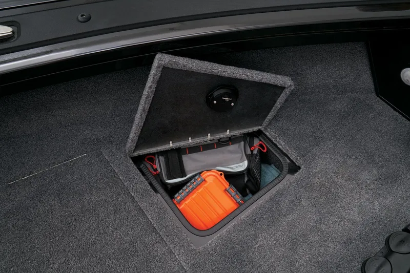 Slide: The Image of 2023 Tracker Targa V-19 WT storage compartment with safety equipment. - 14