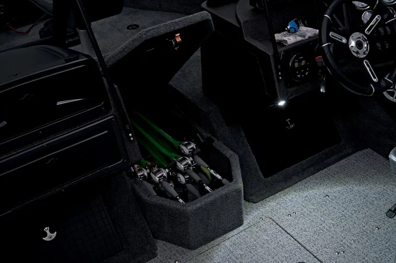 Slide: The Image of 2023 Tracker Targa V-19 WT boat interior with rod storage compartment. - 22