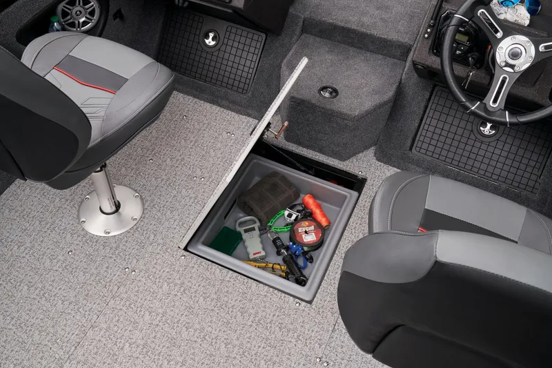Slide: The Image of 2023 Tracker Targa V-19 WT boat interior with underfloor storage compartment. - 24
