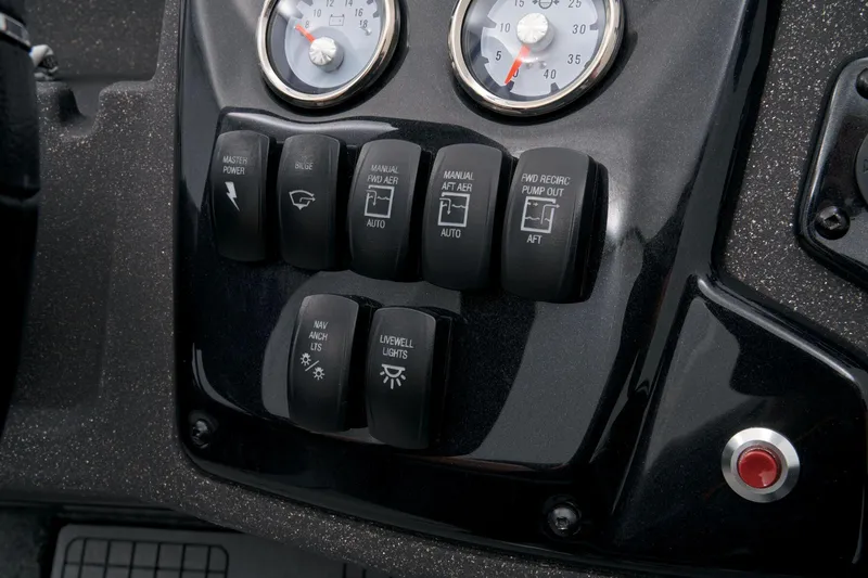 Slide: The Image of Control panel of 2023 Tracker Targa V-19 WT boat with switches and gauges. - 40