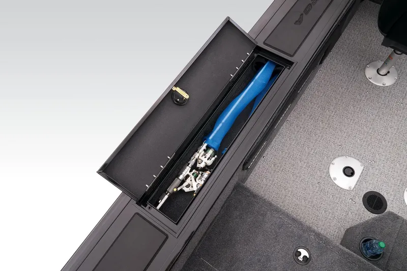 Slide: The Image of 2023 Tracker Targa V-19 WT boat storage compartment with tools. - 47