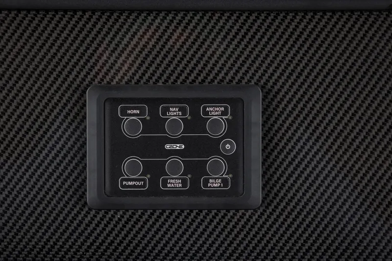 Slide: The Image of Control panel of Skipper-BSK 38NC 2024 boat with various function buttons. - 40