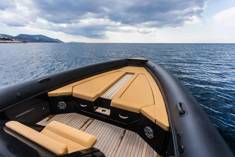 Slide: The Image of 2024 Skipper-BSK 38NC boat with luxurious seating on open water. - 36