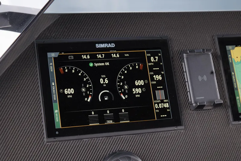 Slide: The Image of Simrad display on Skipper-BSK 38NC 2024 boat dashboard showing engine metrics. - 40