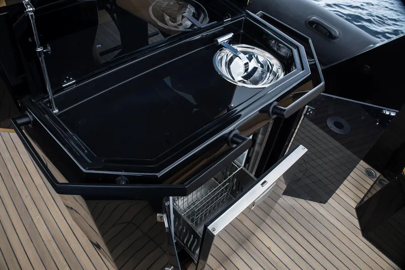 Slide: The Image of Outdoor kitchen on Skipper-BSK 38NC 2024 yacht with sink and dishwasher. - 47