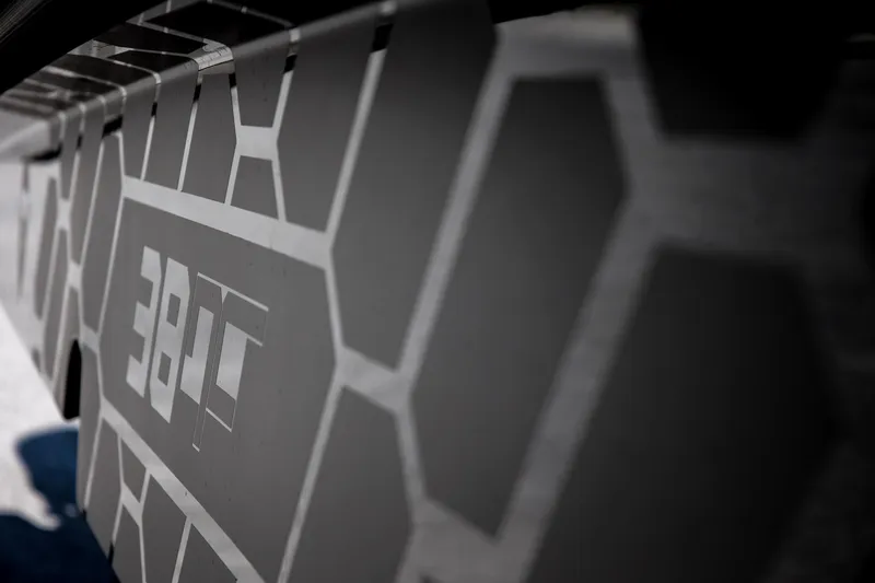 Slide: The Image of Close-up of 2024 Skipper-BSK 38NC boat hull with geometric pattern. - 20