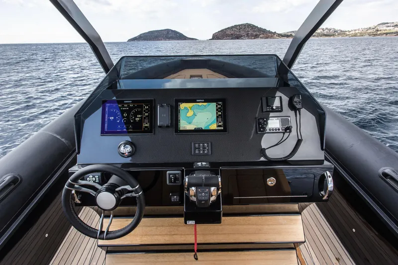 Slide: The Image of 2024 Skipper-BSK 38NC boat dashboard with navigation and control systems. - 28