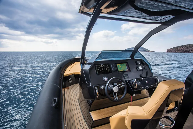 Slide: The Image of 2024 Skipper-BSK 38NC boat dashboard with ocean view. - 31
