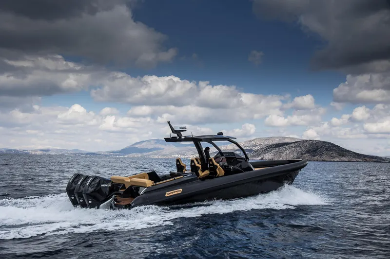 Slide: The Image of 2024 Skipper-BSK 38NC boat cruising on open water under cloudy skies. - 7