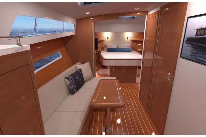 Slide: The Image of Luxurious interior of 2023 MJM 42 yacht with wooden finishes and cozy seating area. - 10