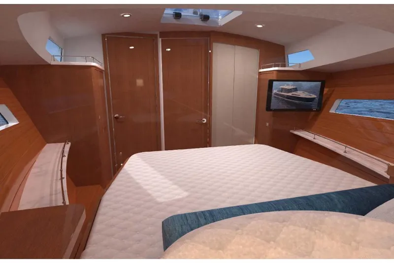 Slide: The Image of Luxurious cabin interior of 2023 MJM 42 yacht with modern amenities and elegant wood finish. - 11