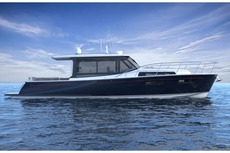 Slide: The Image of 2023 MJM 42 yacht on calm blue water under a clear sky. - 2