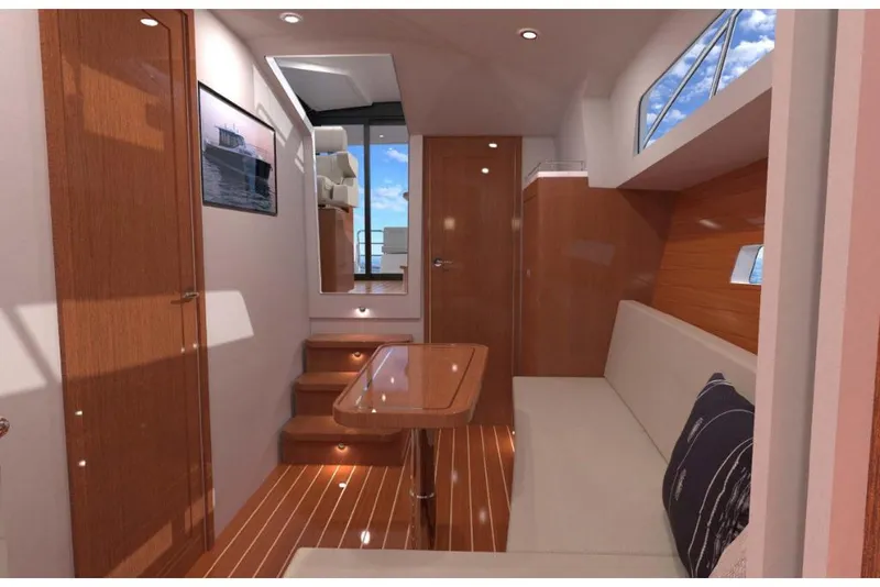 Slide: The Image of Interior of 2023 MJM 42 yacht with wooden finishes and modern seating area. - 8