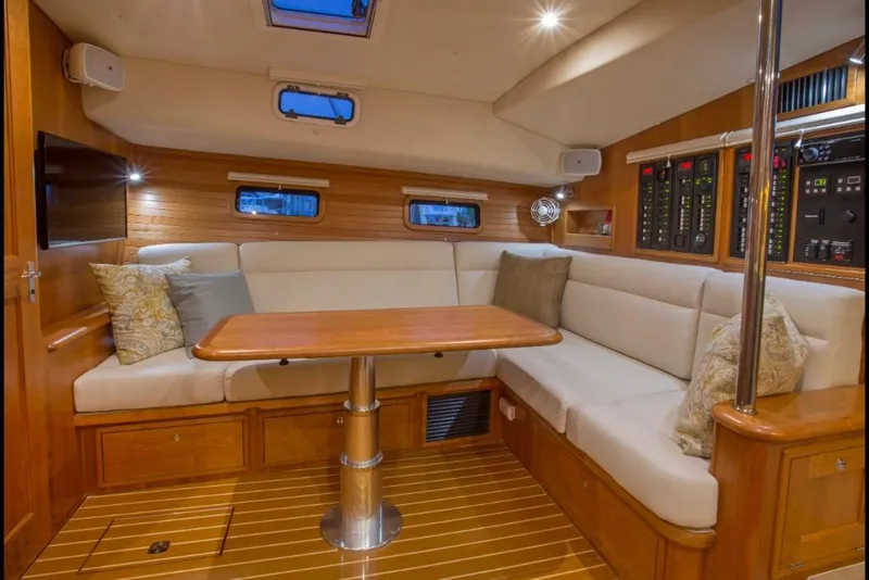 Slide: The Image of Luxurious interior of 2023 MJM 50z yacht with plush seating and wooden finishes. - 26