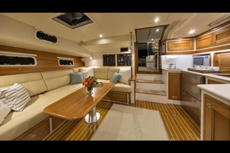 Slide: The Image of Luxurious interior of 2023 MJM 50z yacht with modern kitchen and cozy seating area. - 30