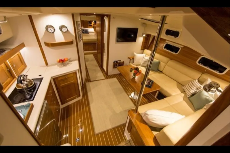 Slide: The Image of Luxurious interior of 2023 MJM 50z yacht with modern kitchen and cozy seating area. - 31
