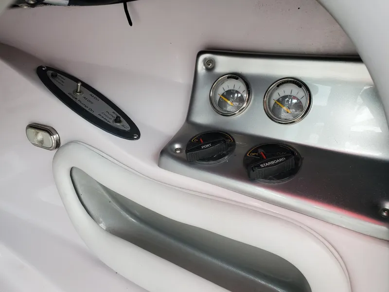 Slide: The Image of 2005 Correct Craft SV-211 Limited dashboard with gauges and controls. - 25
