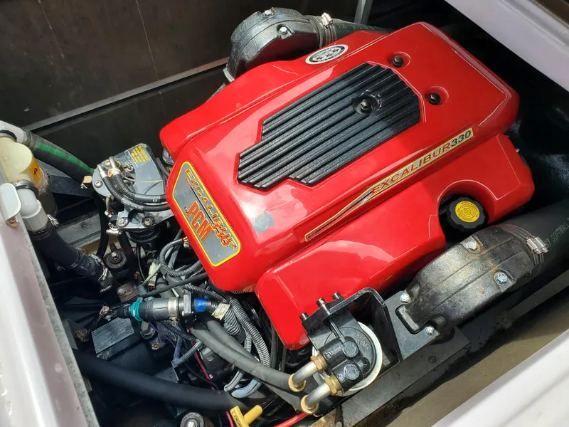 Slide: The Image of 2005 Correct Craft SV-211 Limited engine, red cover, detailed components visible. - 30