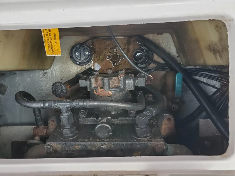 Slide: The Image of 2005 Correct Craft SV-211 Limited engine compartment with visible components and wiring. - 32