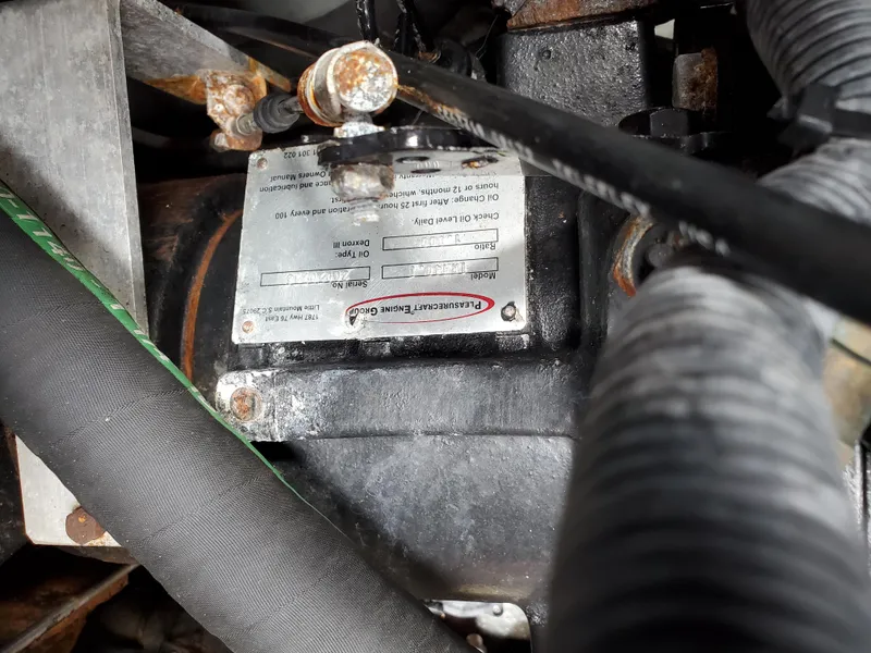 Slide: The Image of Engine compartment of a 2005 Correct Craft SV-211 Limited boat, showing mechanical components. - 33