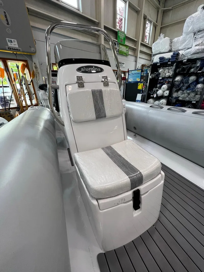 Slide: The Image of 2023 AB Inflatables Alumina 16 ALX boat interior with cushioned seating. - 8