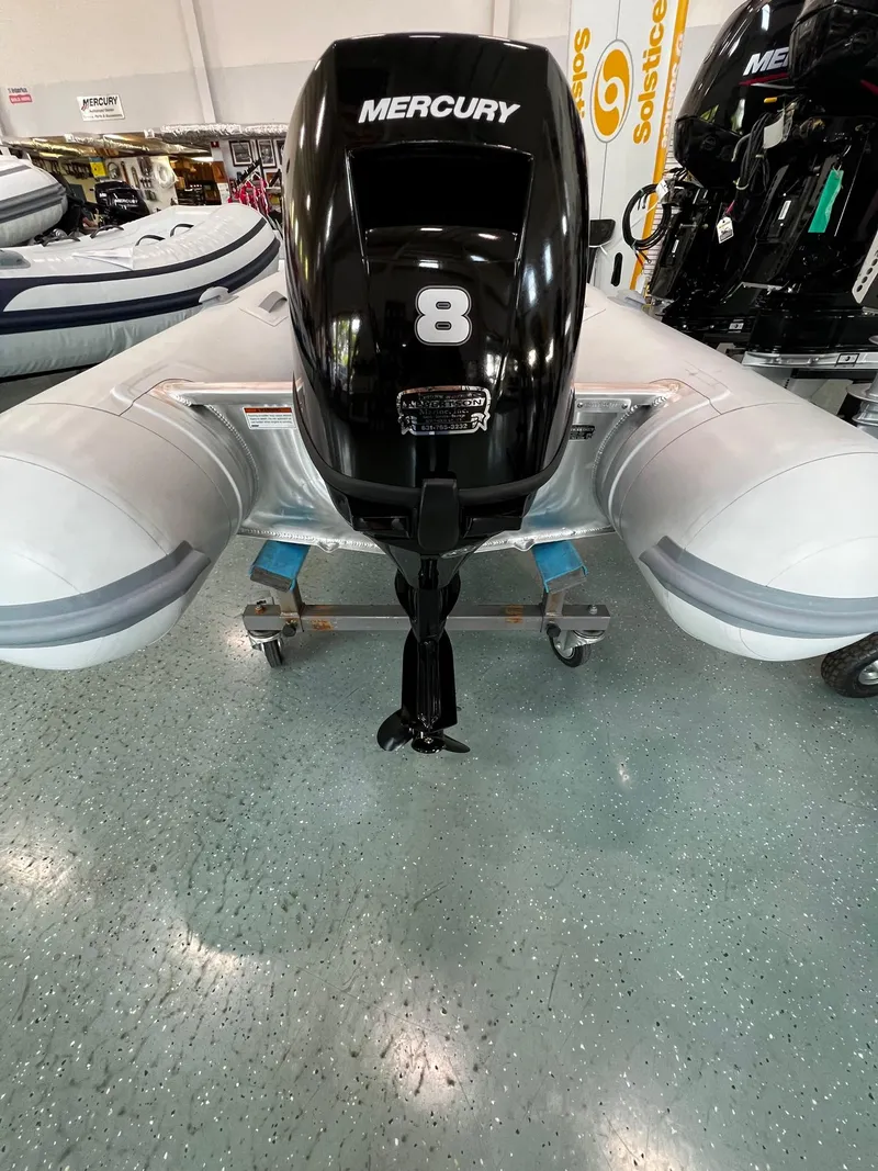 Slide: The Image of 2023 AB Inflatables Lammina 9 UL with Mercury 8 outboard motor. - 2