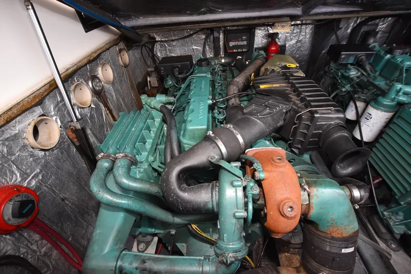 Slide: The Image of 2001 Carolina Classic Express with Marlin Tower engine compartment showing detailed engine components. - 16