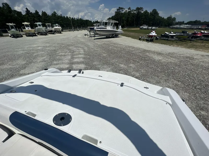 Slide: The Image of Alt text: 2017 Tahoe 500 TF boat in a marina with other boats in the background. - 8