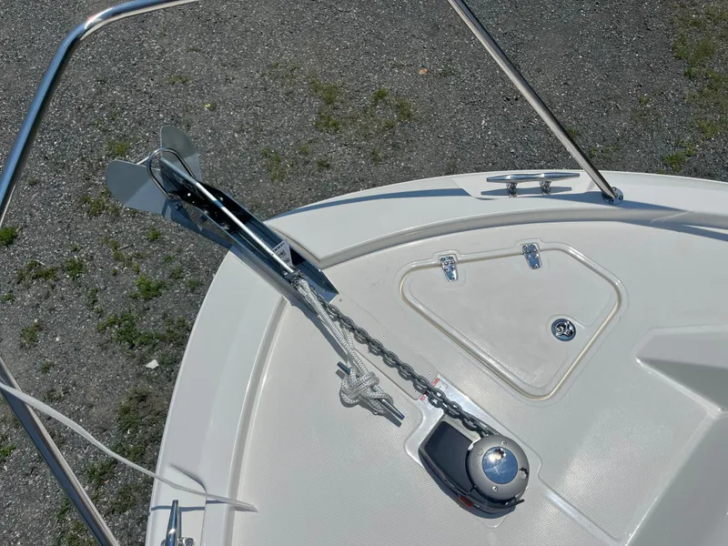 Slide: The Image of Bow of 2025 Boston Whaler 325 Conquest with anchor and chain on deck. - 47