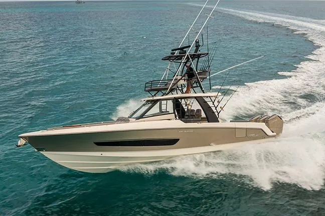 The Image of 2026 Boston Whaler 420 Outrage cruising on ocean, custom order available. - 0