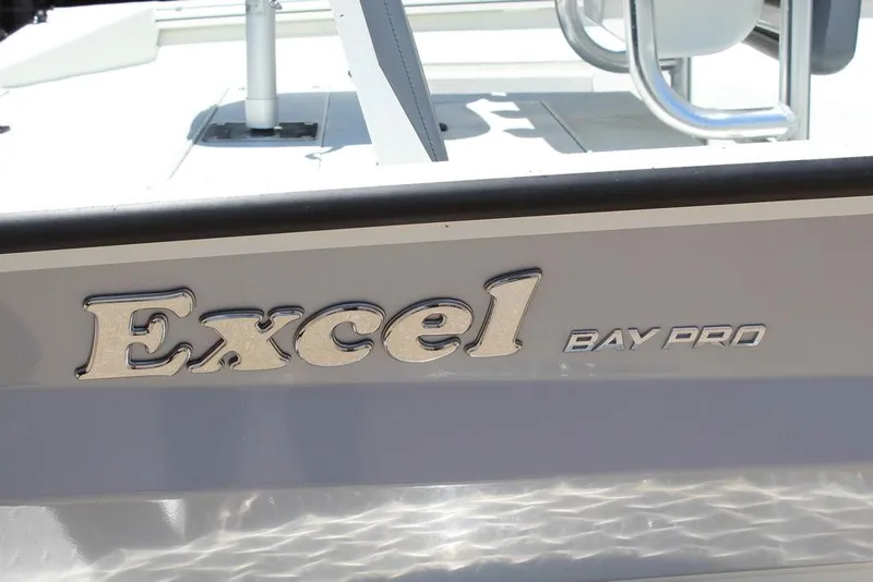 Slide: The Image of 2022 Excel Bay Pro 203 boat model logo on the side of the vessel. - 14