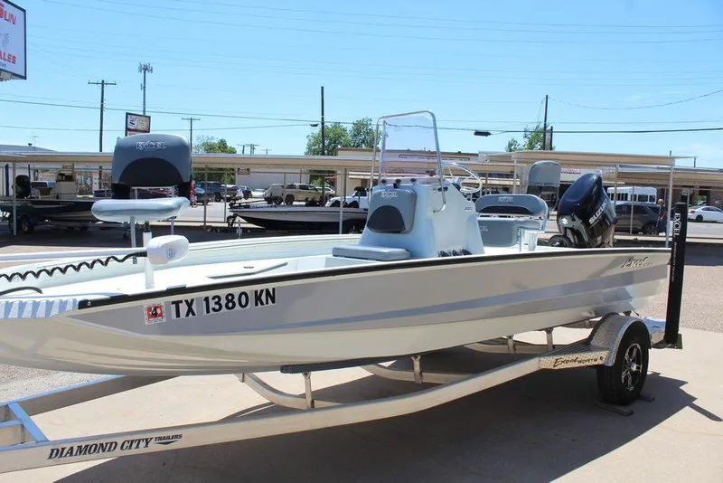 Slide: The Image of 2022 Excel Bay Pro 203 boat on a Diamond City trailer. - 6
