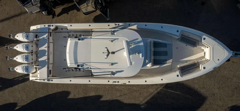 Slide: The Image of Aerial view of 2023 Solace 41 CS boat with four engines. - 1