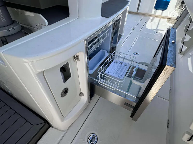 Slide: The Image of Built-in storage compartment on the 2023 Solace 41 CS boat. - 17